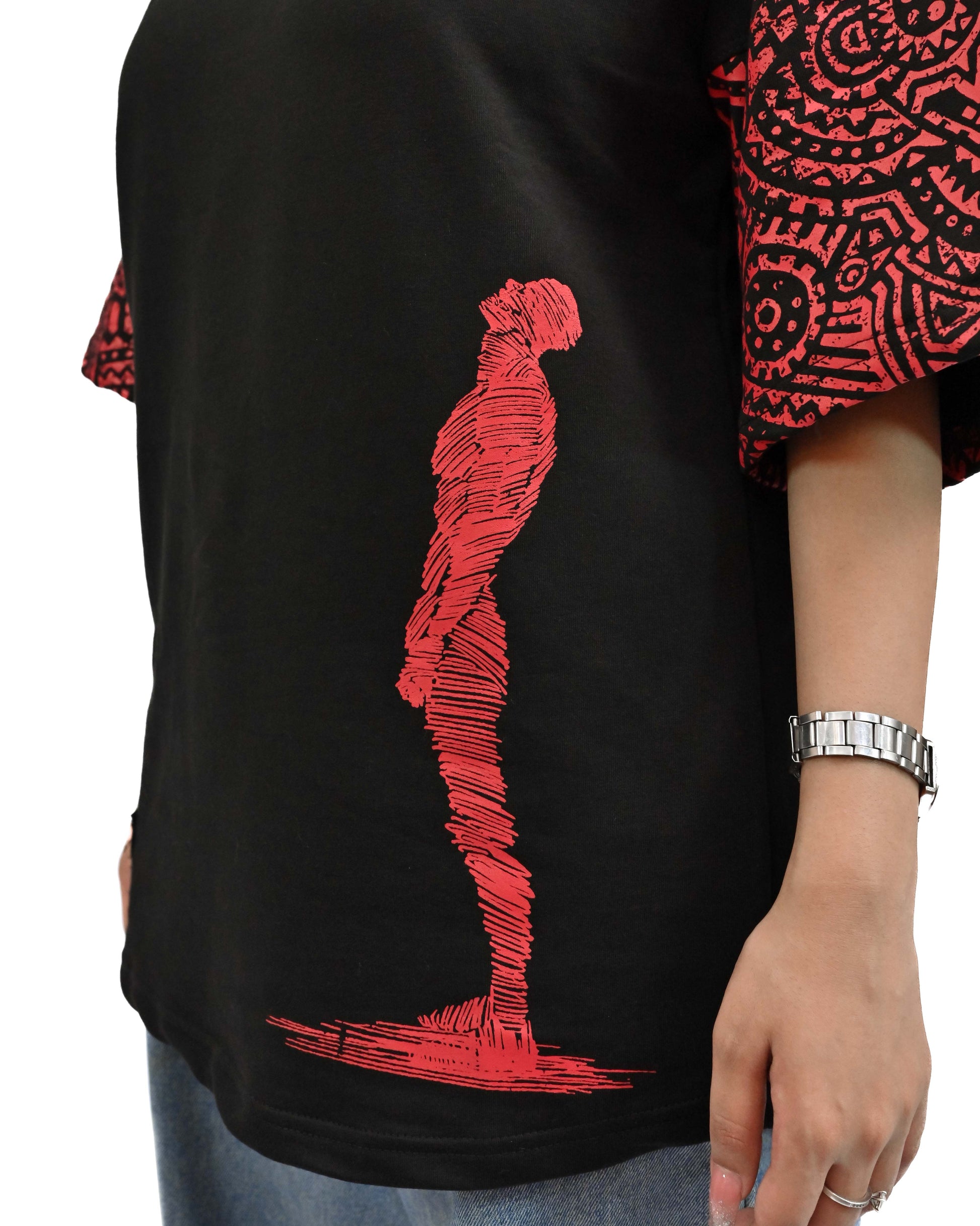 Person wearing "Lost in Grief" a Cream And Black graphic t-shirt with text on the back, standing against a white background made in pakistan