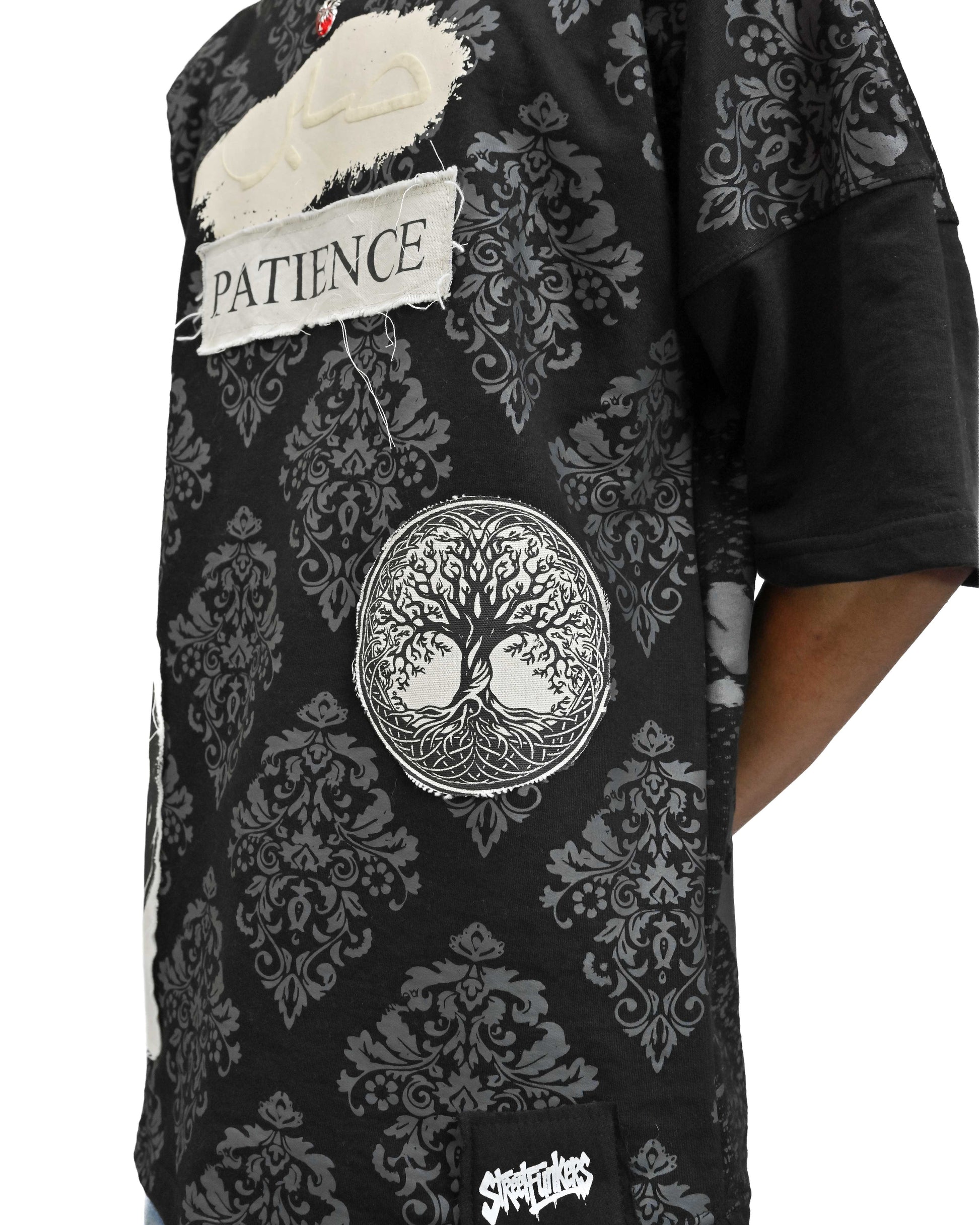 Person wearing "Black Verse" a white And Black graphic t-shirt with text on the back, standing against a white background made in pakistan