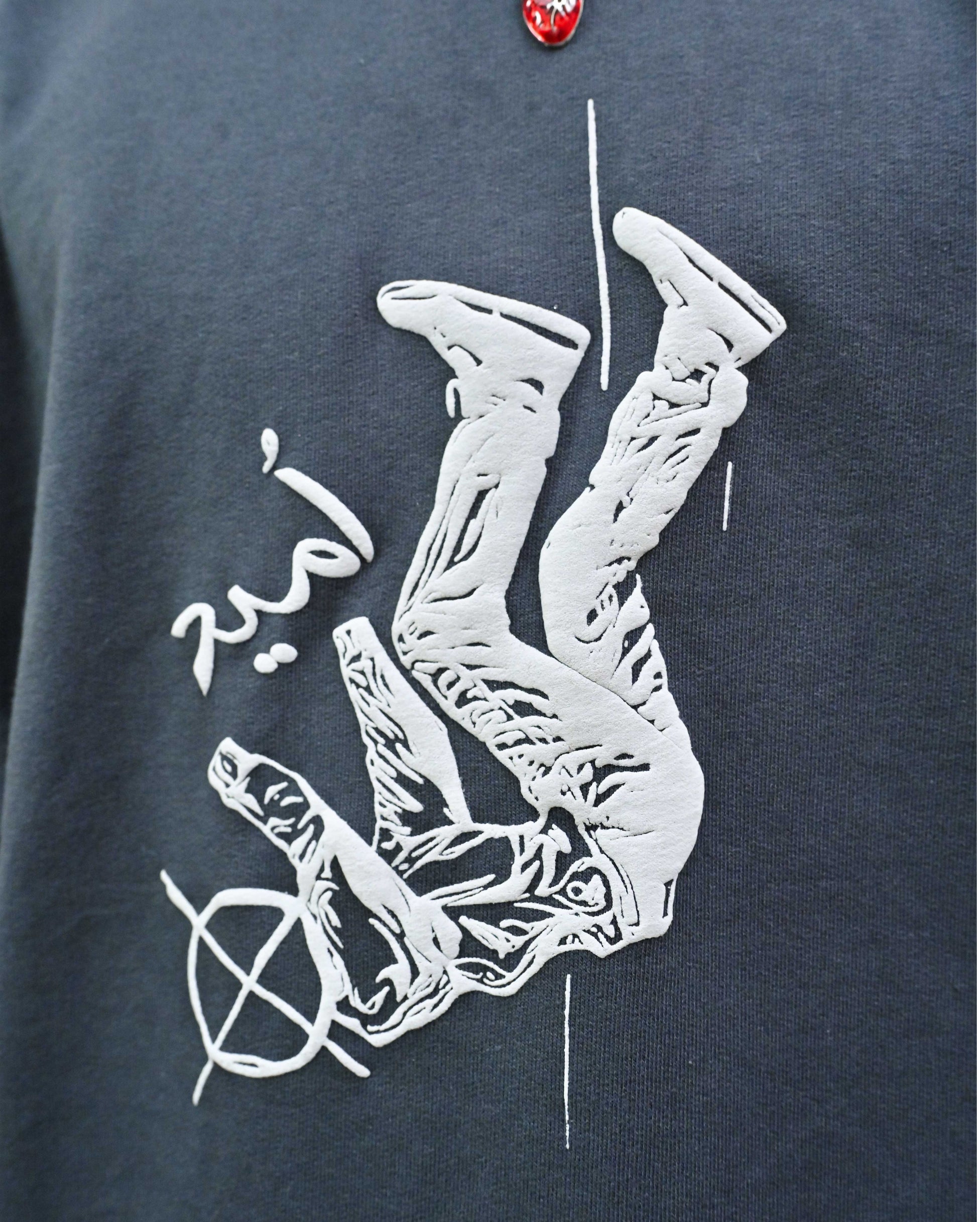 Person wearing "Ash Fade" a white graphic t-shirt with text on the back, standing against a white background made in pakistan