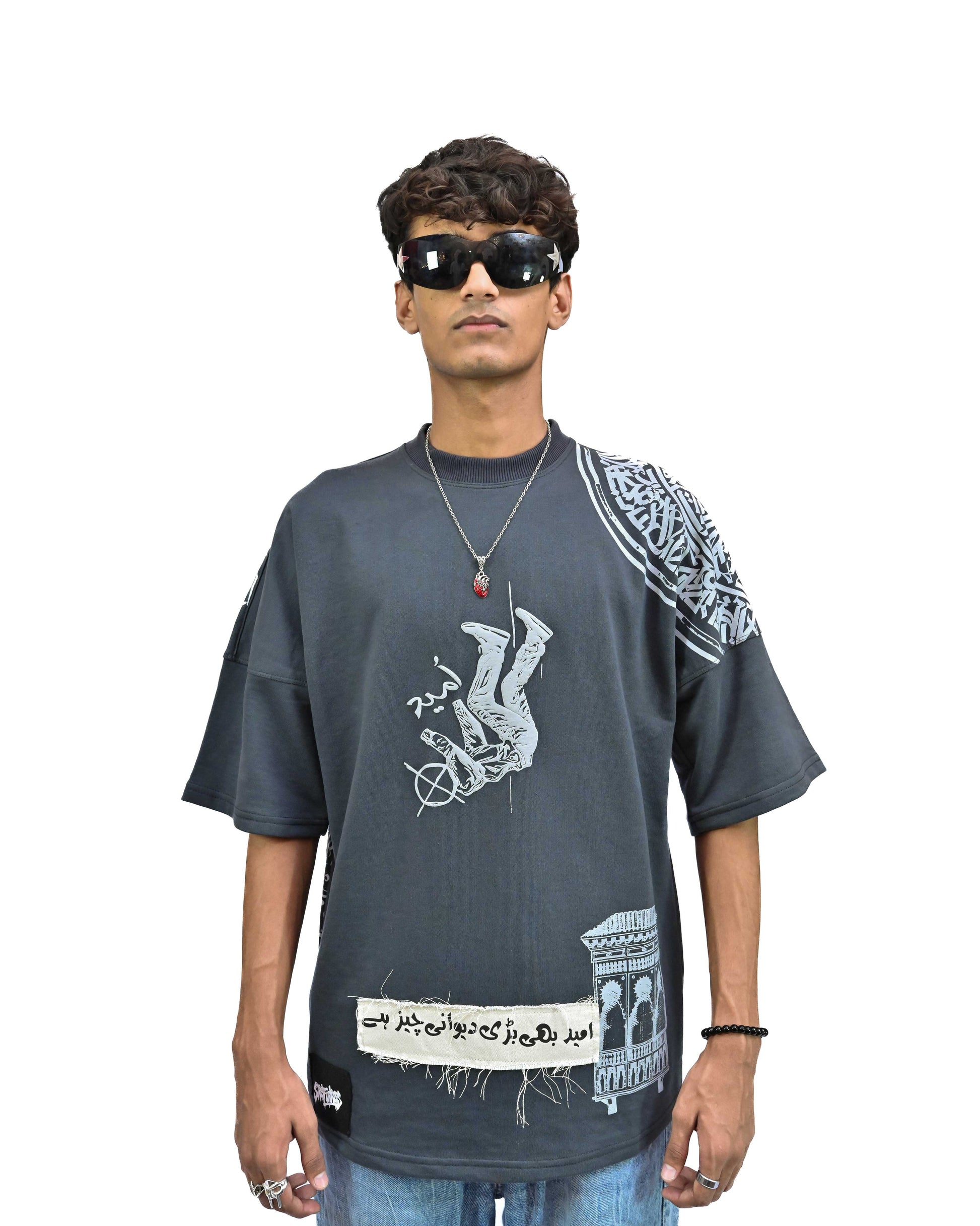 Person wearing "Ash Fade" a white graphic t-shirt with text on the back, standing against a white background made in pakistan