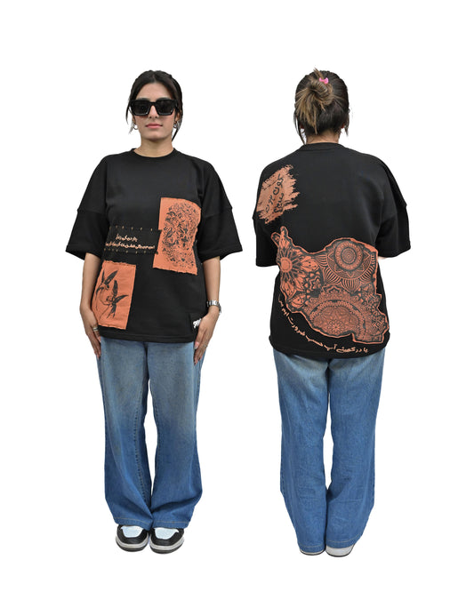 Person wearing "Vese in Stone" a Cream And Black graphic t-shirt with text on the back, standing against a white background made in pakistan