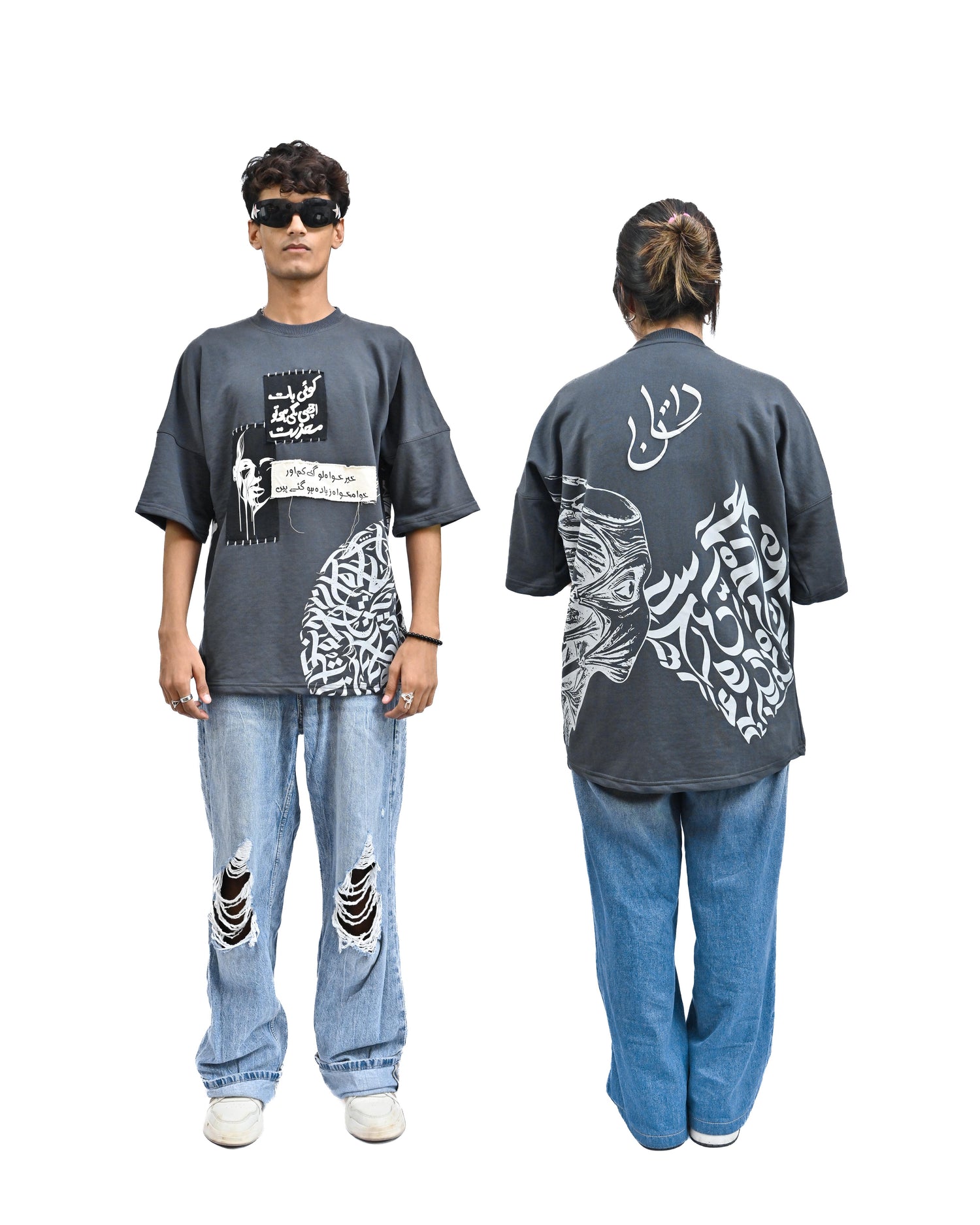 Person wearing "Chronicle" a white And Black graphic t-shirt with text on the back, standing against a white background made in pakistan